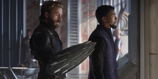 Steve Rogers examines his vibranium arm shield as T'Challa stares out the window in 'Avengers: Infin