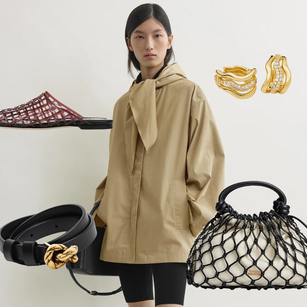 A model wearing a trench coat from Toteme.