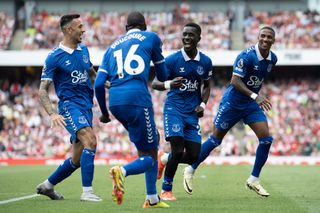 Everton players celebrate a goal against Arsenal in the Premier League in May 2024.