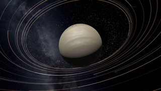 Relaxing PC games — a flock of moons orbit a beige gas giant in Universe Sandbox.