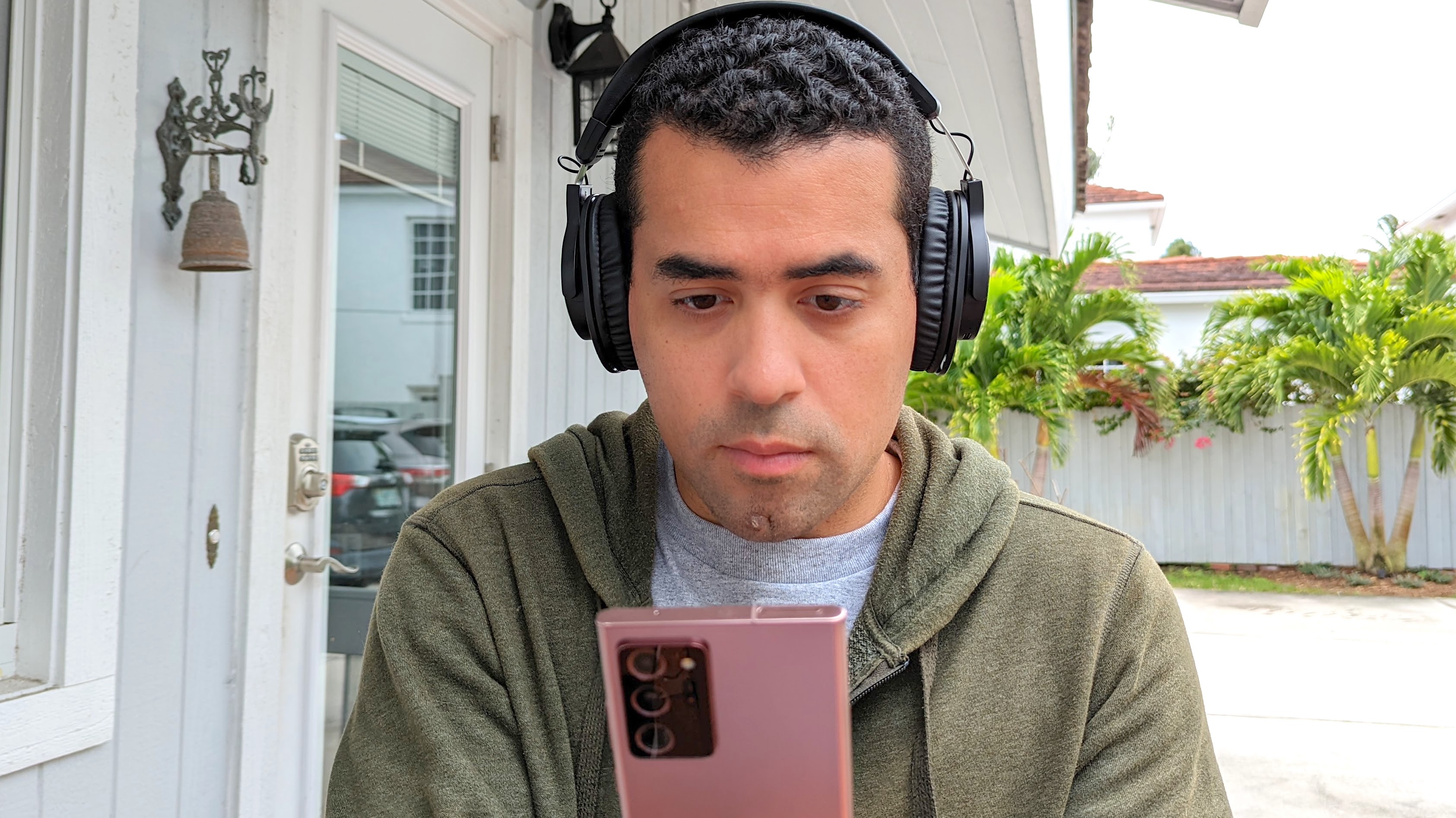 Our reviewer using the Audio-Technica ATH-M20xBT as a calling headset