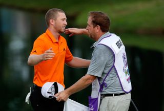 Berger hugs caddie