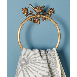 gold towel ring with bird on branch detail