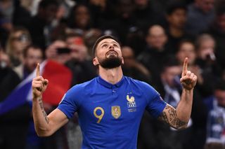France's forward Olivier Giroud celebrates after scoring the 2-0 goal during the UEFA Euro 2020 Group H qualification football match between France and Iceland at the Stade de France stadium in Saint-Denis, north of Paris, on March 25, 2019.