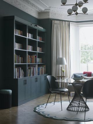 blue office with built-in bookcase