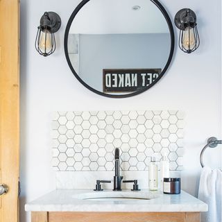 grey bathroom with basin vanity and mirror