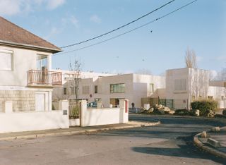 Street view of community centre and neighbors