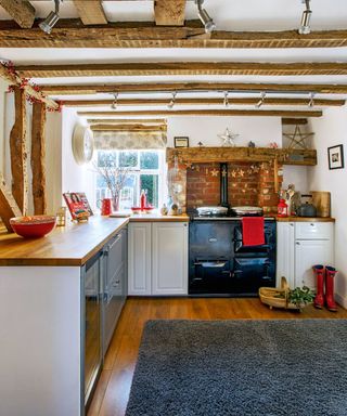 wall clock hangs on kitchen wall