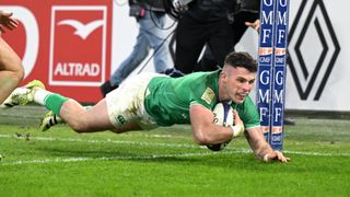 Calvin Nash of Ireland scores a diving try ahead of the Ireland vs Italy Six Nations 2024 clash.