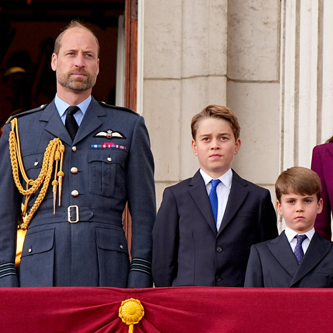 Prince William stands on the Buckingham Palace balcony with children Prince George, Princess Charlotte, and Prince Louis, and wife Kate Middleton