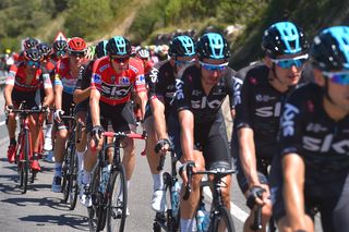 Chris Froome is protected by a group of Team Sky riders