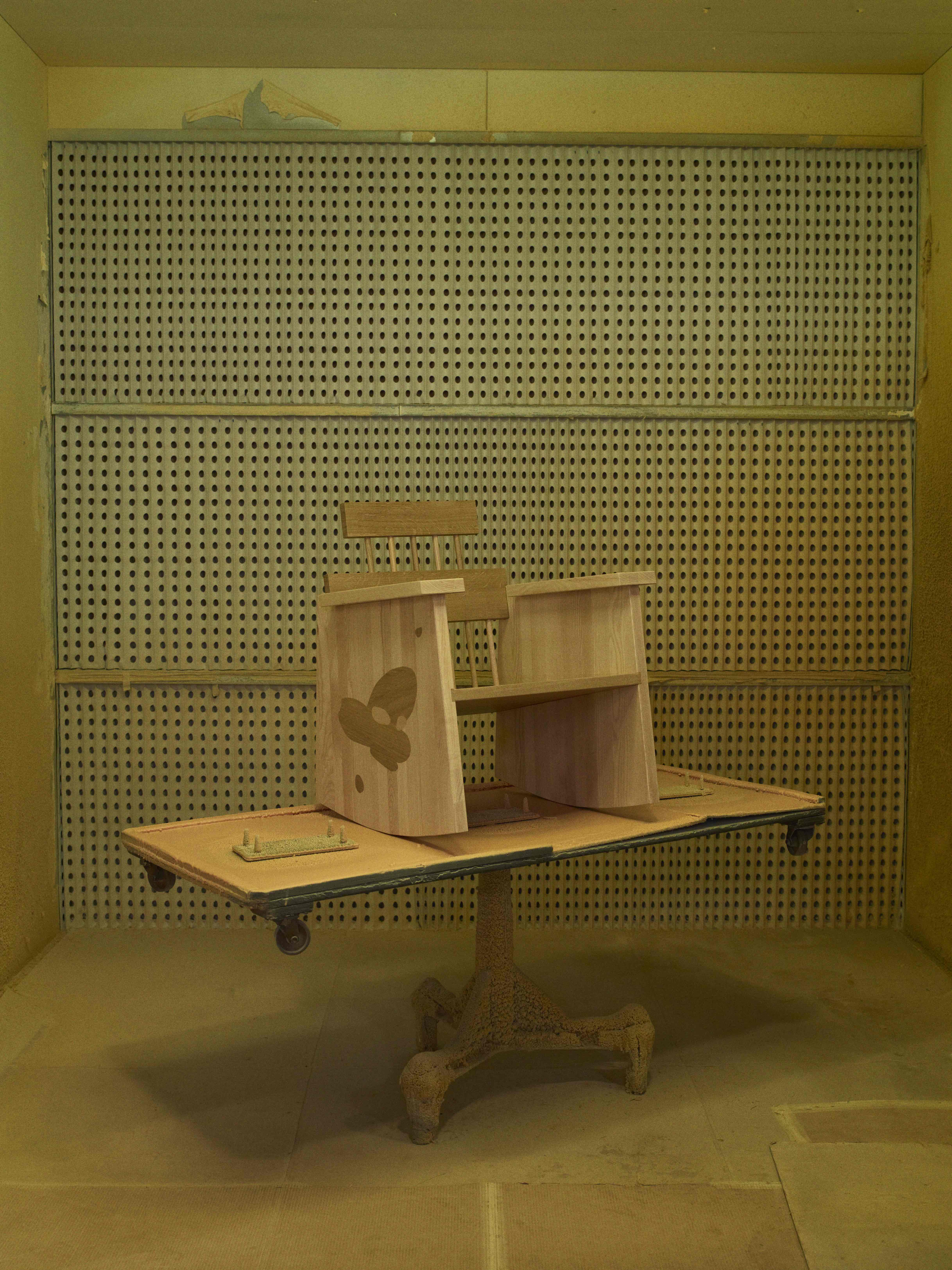 wooden chair on plinth