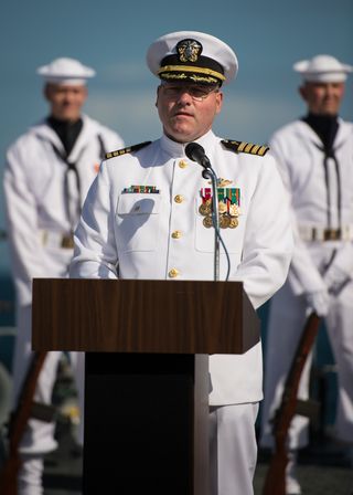 Navy Force Chaplain, Capt. Donald P. Troast, CHC, USN speaks during a burial at sea service for Apollo 11 astronaut Neil Armstrong aboard the USS Philippine Sea (CG 58), Friday, Sept. 14, 2012, in the Atlantic Ocean.