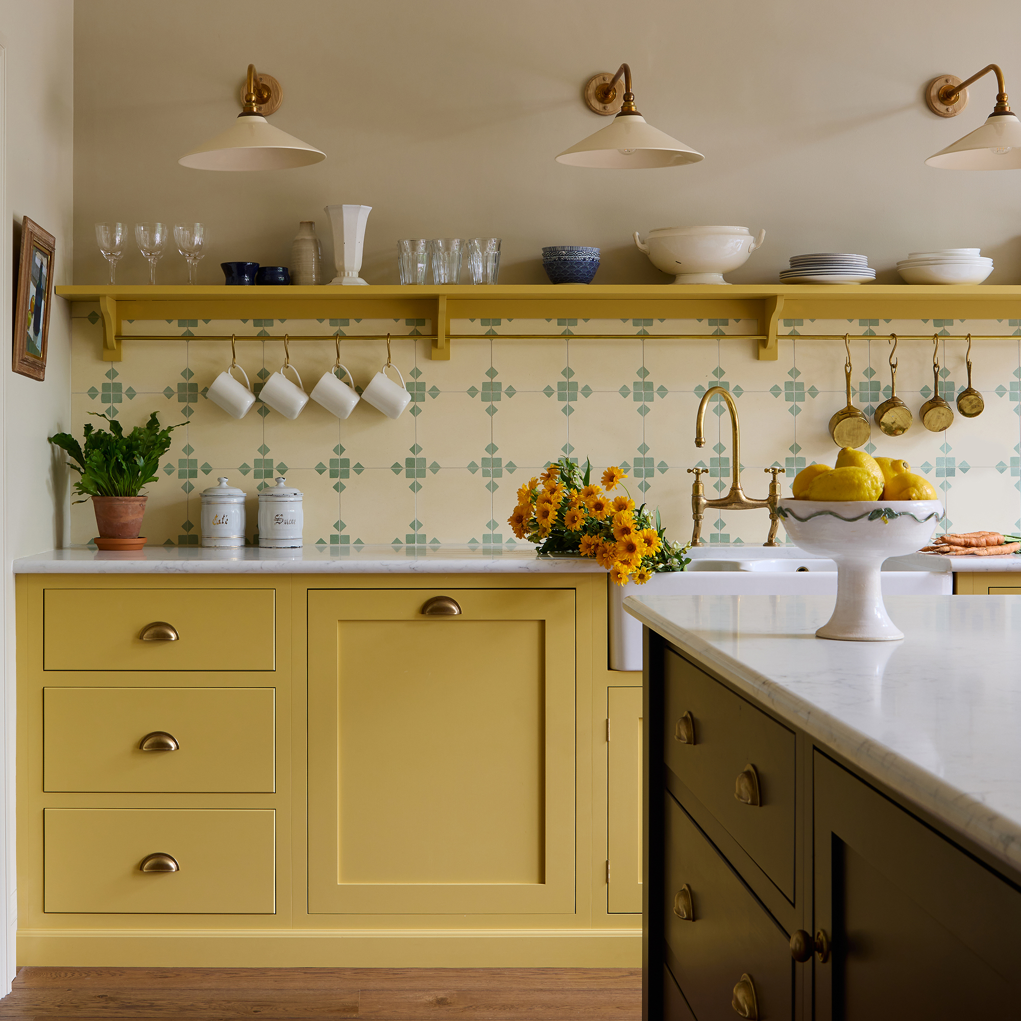 Yellow kitchen with traditional tiles