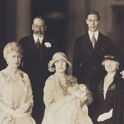 Queen Elizabeth with her parents and grandparents at her christening