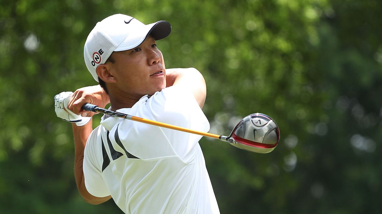 Anthony Kim hits a drive