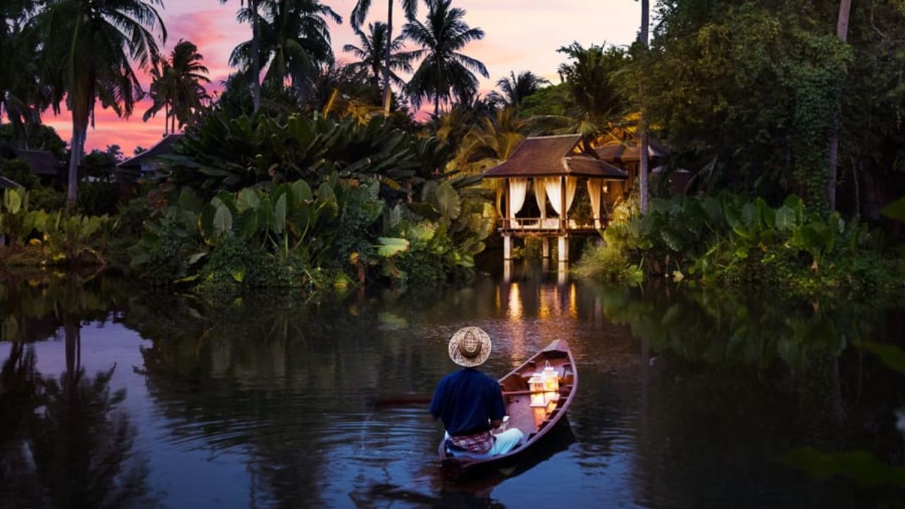 Lagoon view at night at Anantara Mai Khao Phuket Villas