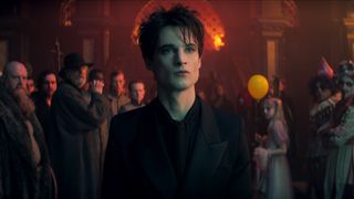 Tom Sturridge's Morpheus/Dream standing in front of a crowd in The Sandman season 2