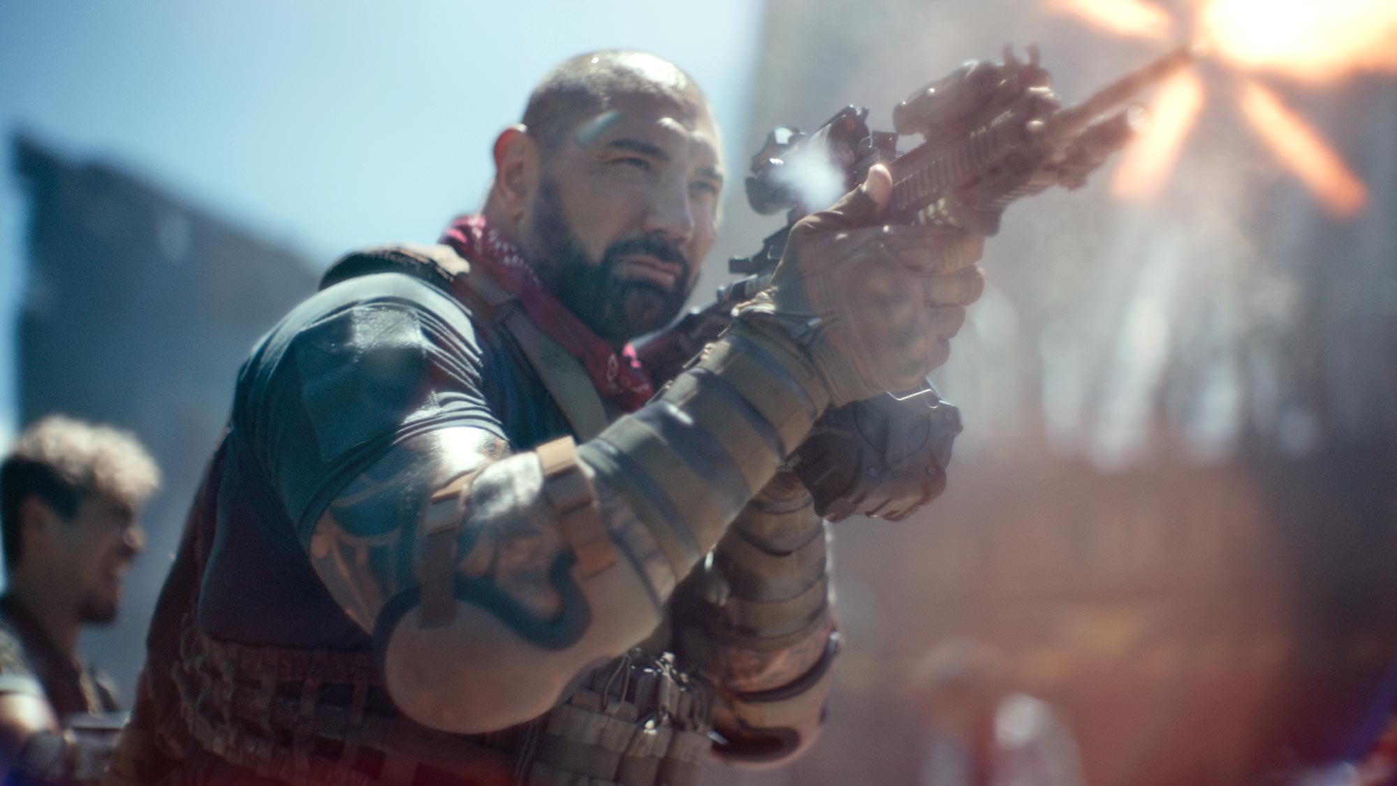 Bautista firing a gun in Army of the Dead