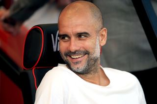 Xavi says Guardiola (pictured) is a reference for his managerial career