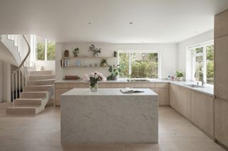 Emmanuel House by Dominic McKenzie Architects kitchen with marble island