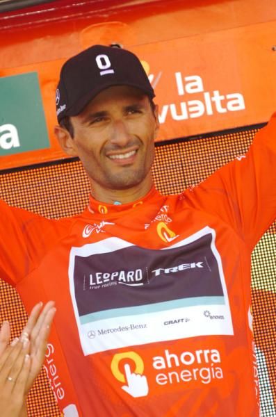Daniele Bennati (Leopard Trek) smiles in the red jersey.
