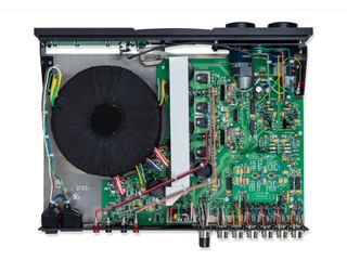 Note the generous power supply and typically neat internal construction of Naim's Supernait 3 