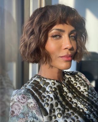 Nicole Ari Parker with short bob and fringe