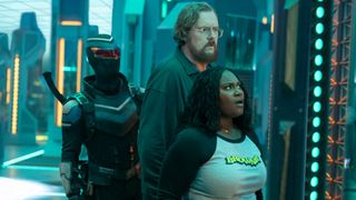 Vigilante (Freddie Stroma), John Economos (Steve Agee) and Adebayo (Danielle Brooks) in the Quantum Unfolding Chamber in Peacemaker season 2.