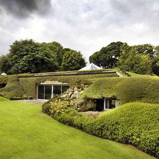 underground house with garden lawn