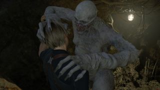 Leon S. Kennedy fighting off Regenerator enemy