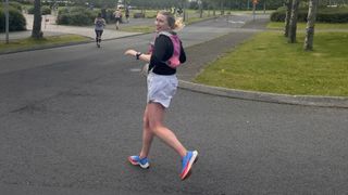 Lois Mackenzie running a marathon wearing the Lululemon Track That shorts