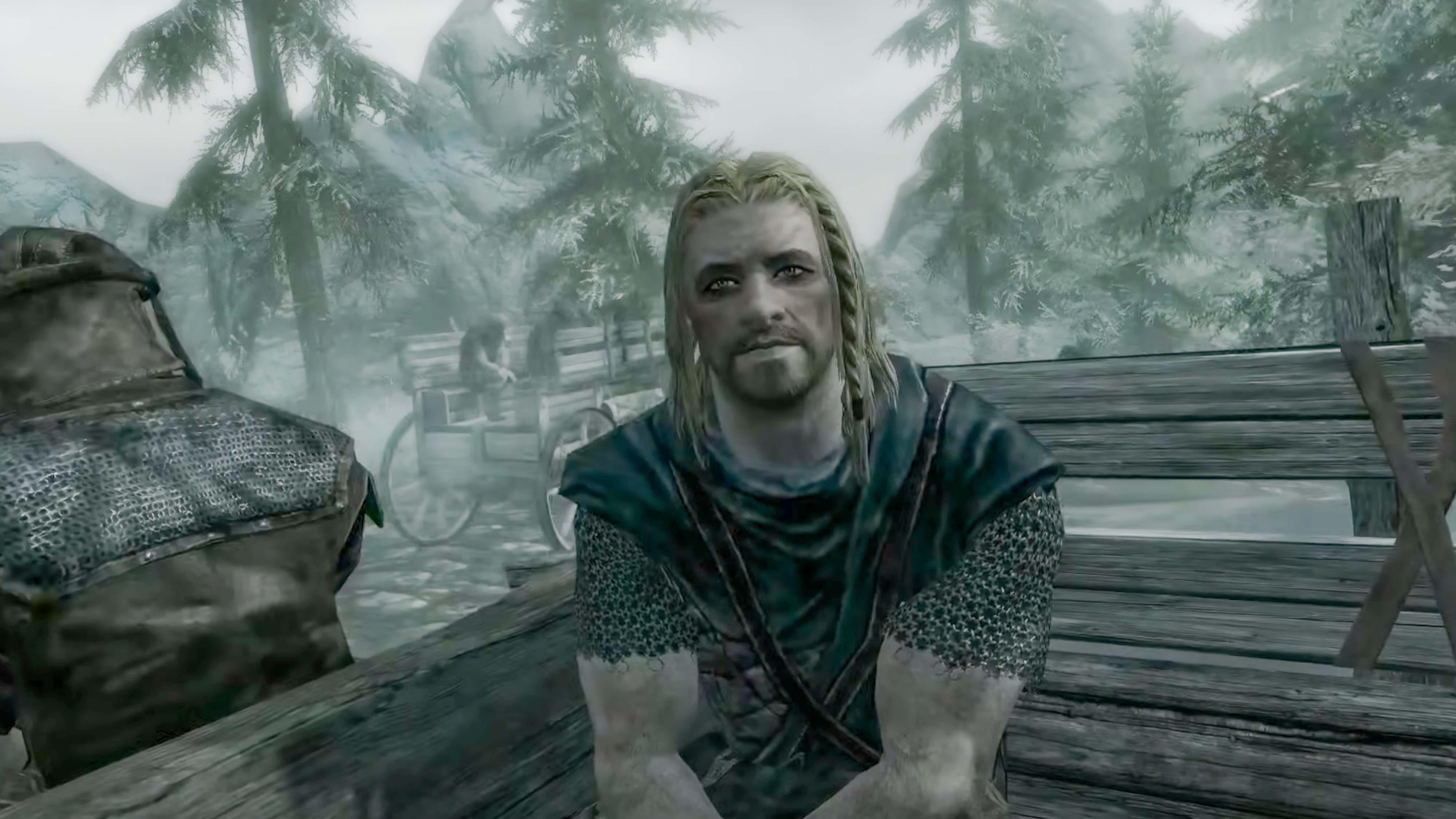 A Screenshot from The Elder Scrolls V: Skyrim showing the opening prisoner in a wagon.