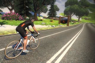Image shows an avatar cycling around Zwift.