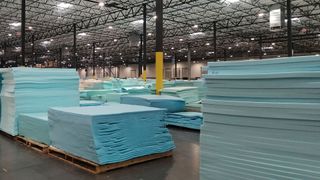 Piles of foams in a mattress factory
