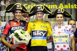 Chris Froome on top step of the Aalst criterium podium with Greg Van Avermaet to his left and Rafal Majka to his right