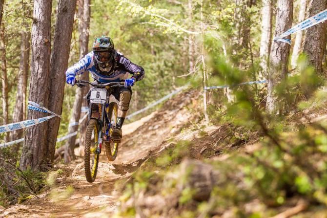 Sam Hill (Team CRC / Nukeproof) on his way to the podium in Andorra