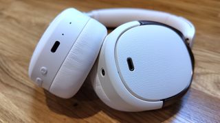 Edifier WH950NB review; a close up of a pair of earcups on headphones