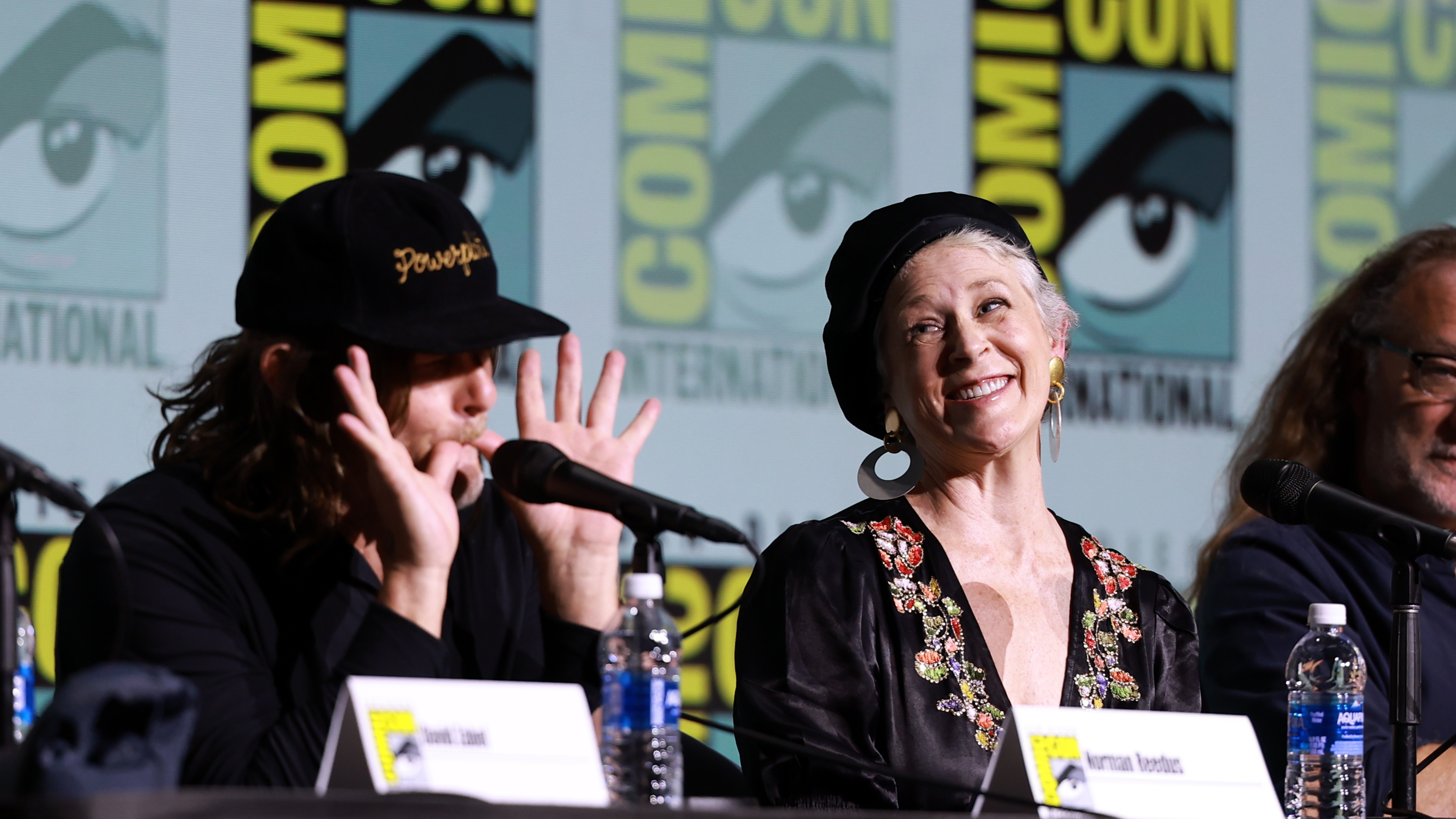 Norman Reedus and Melissa McBride speak onstage during AMC Networks' "The Walking Dead: Daryl Dixon - The Book Of Carol" Press Conference during 2024 Comic-Con International at Hilton Bayfront on July 26, 2024 in San Diego, California.