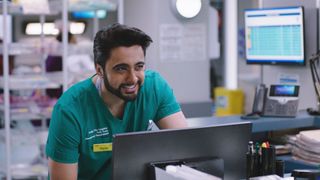 Casualty star Manpreet Bachu as a smiling junior doctor Tariq Hussein. 