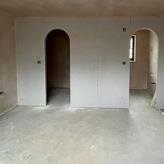 plastered wall with archways