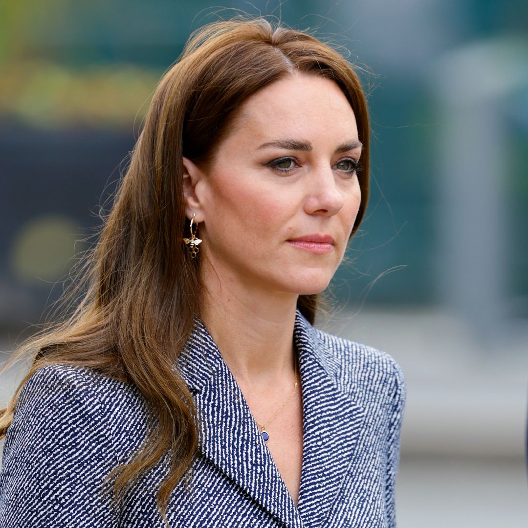 Kate Middleton wears a blue tweed coat dress