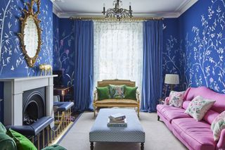 living room with blue botanical wallpaper