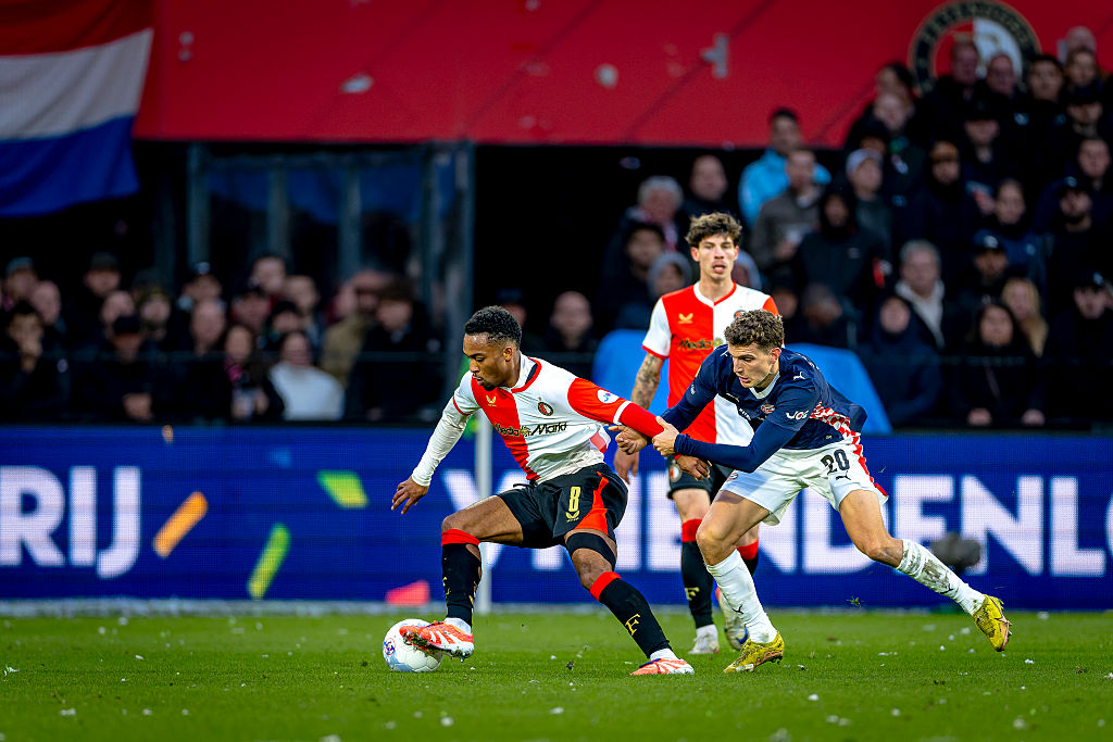SC Feyenoord Rotterdam midfielder Quinten Timber and PSV Eindhoven midfielder Guus Til play during the match SC Feyenoord Rotterdam vs PSV Eindhoven at the Stadium de Kuip for the Dutch Vriendenloterij Eredivisie season 2025-2026 in Rotterdam, Netherlands, on October 26, 2025.