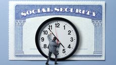 A clock stands in front of a large Social Security card