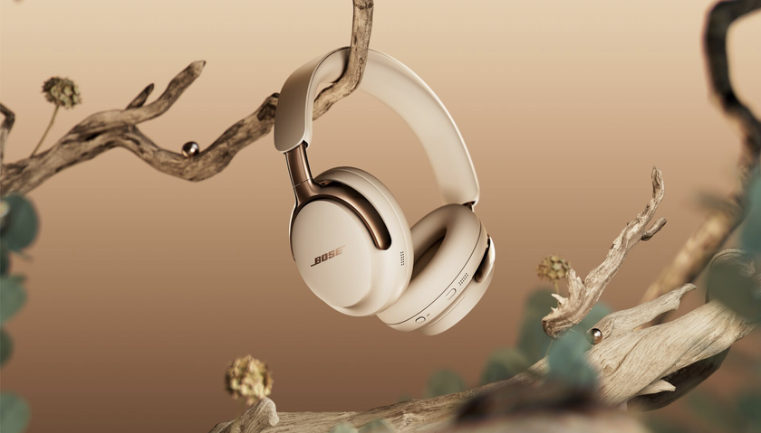 Bose QCU Headphones (2nd Gen) in &#039;Driftwood Sand&#039; on tree branch, with pearls also growing on the tree 