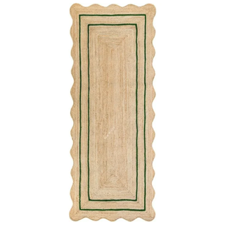 runner rug with scalloped edge, green detailing, and a jute finish