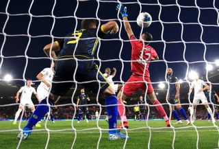 Raheem Sterling, centre, scores against Kosovo