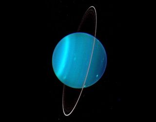 Uranus is uniquely tipped over among the planets in our solar system. Uranus' moons and rings are also orientated this way, suggesting they formed during a cataclysmic impact which tipped it over early in its history.