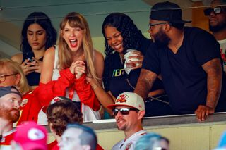 Taylor Swift attending chiefs games in chiefs color outfits